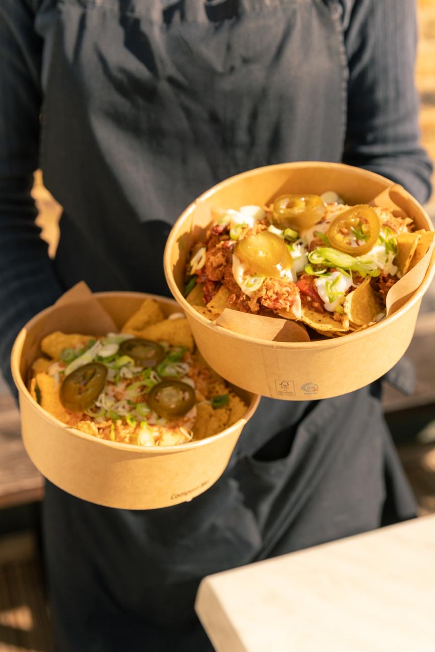 Loaded nachos in kraft bowls